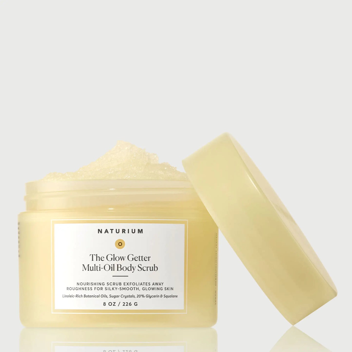 the-glow-getter-multi-oil-body-scrub-x3 NATR-40028-GlowGetter-Multi-Oil-Body-Scrub-Front-CapOff-bonebkgd.webp