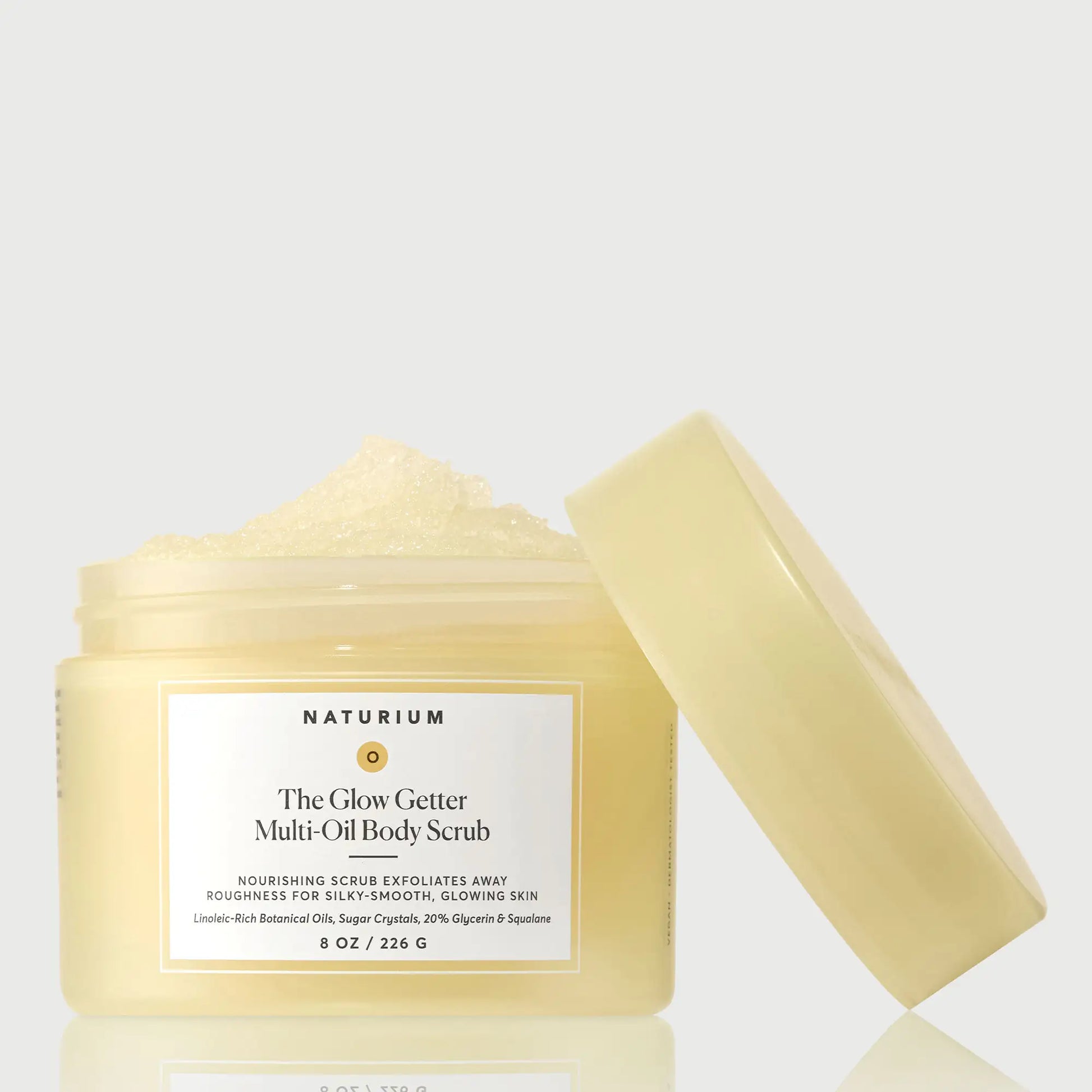 the-glow-getter-multi-oil-body-scrub-x3 NATR-40028-GlowGetter-Multi-Oil-Body-Scrub-Front-CapOff-bonebkgd.webp