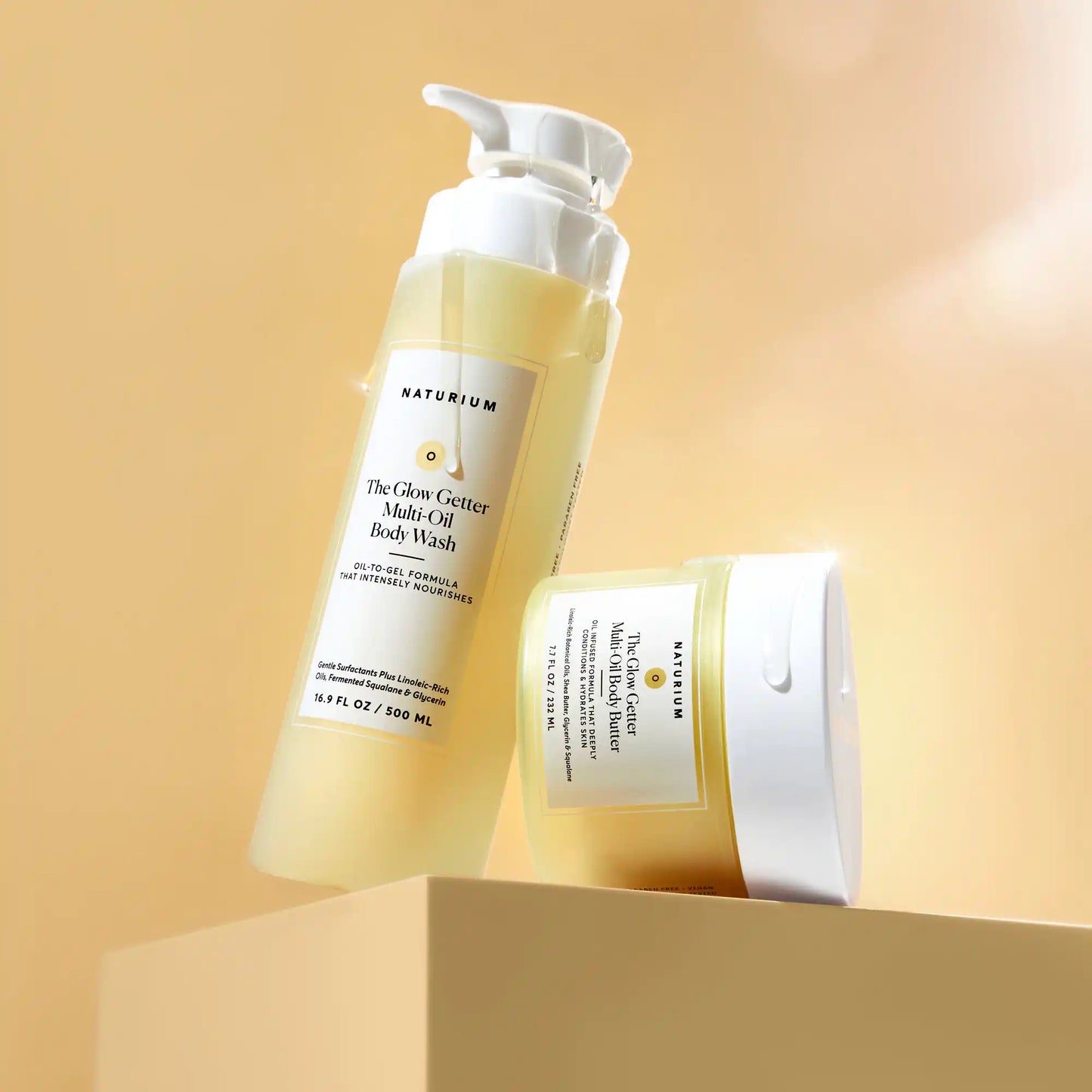 the-glow-all-out-body-bundle-f3 gg-bodybutter_1464-crop_revcolor_FL.webp